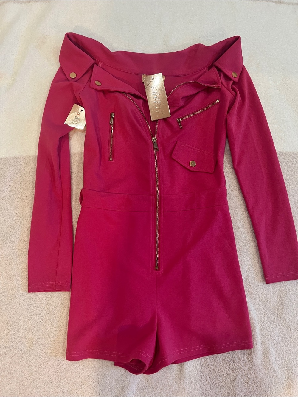 Shop17 NWT Fuchsia Romper with Gold Accents. Zip Front long sleeves with shorts.